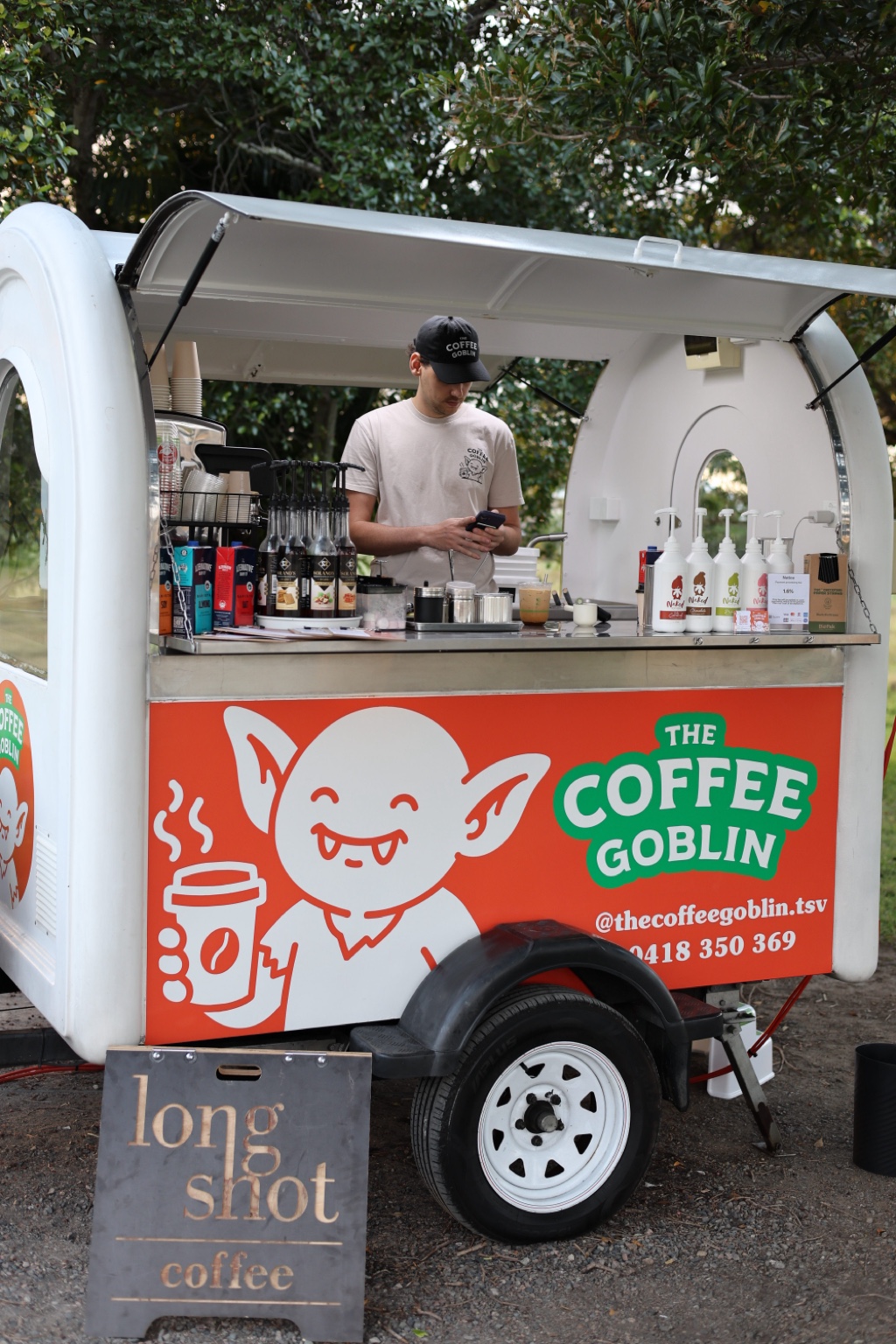 The Coffee Goblin van with its orange goblin panel and green lettering